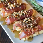 Crispy Prosciutto Wrapped Boursin Cheese with Honey and Chopped Nuts (Four Ingredients)