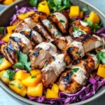 Jerk Chicken & Mango Slaw Bowls with Honey Lime Cream